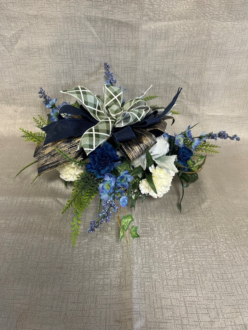 Blue centerpiece in a white wicker basket.