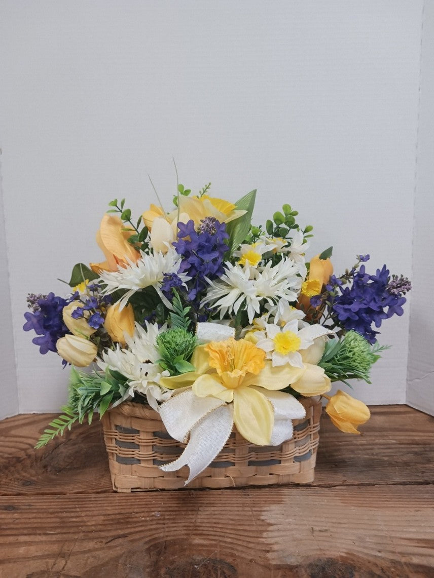 Spring flowers in a wicker basket
