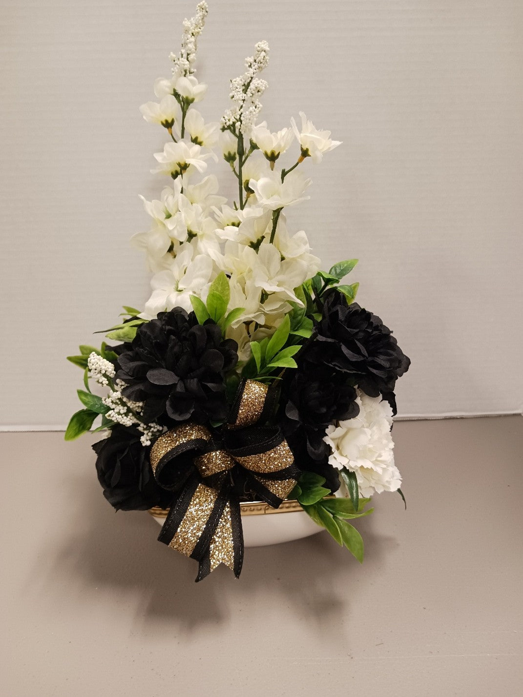White and Black Arrangement with Black and Gold Bow